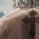 Image for article titled God Gets Celtic Cross Tattooed On Back